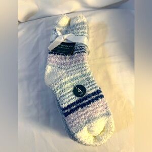 FOUR PAIRS OF FUZZY PINK SOCKS